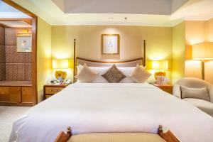 青岛颐中皇冠假日酒店客房内的一张或多张床位