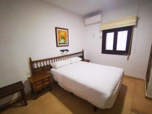 La Quinta De Santillan客房内的一张或多张床位