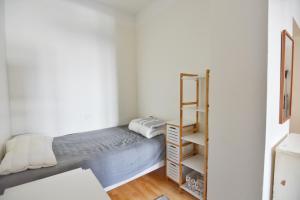 HOMELY - City Apartment 50m2客房内的一张或多张床位
