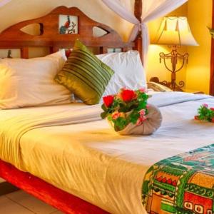 Africa House Zanzibar客房内的一张或多张床位