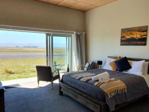 Pukaki Air Lodge客房内的一张或多张床位