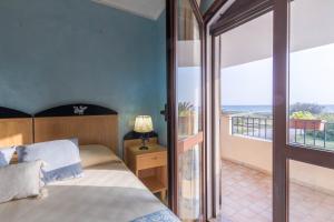 Hotel Villa del Mare Solanas客房内的一张或多张床位