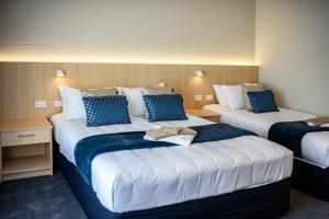塔卡普纳国际汽车旅馆客房内的一张或多张床位