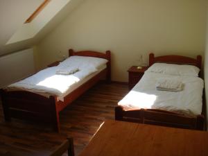 Penzion Bruder客房内的一张或多张床位