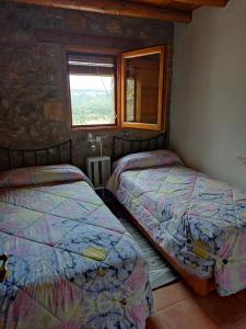 Casa Rural El Boixar - El Mirador客房内的一张或多张床位