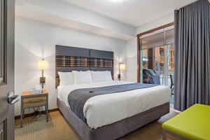 Stoneridge Mountain Resort Condo hosted by Fenwick Vacation Rentals客房内的一张或多张床位