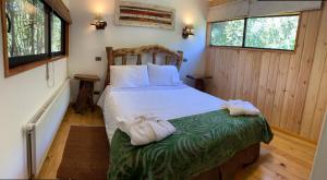 普孔卡瓦尼亚斯自然公园山林小屋客房内的一张或多张床位