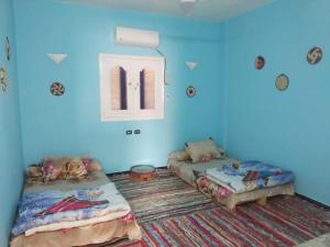 Nubian Kingdom Aragheed House客房内的一张或多张床位