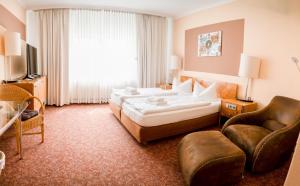 昂克塞酒店客房内的一张或多张床位