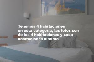阿特利斯科埃斯梅拉达酒店的卧室配有一张挂在墙上的床铺