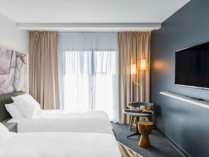 Mercure Hotel & Spa Bastia Biguglia客房内的一张或多张床位