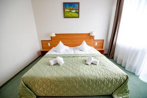 瑞瓦鲁斯酒店客房内的一张或多张床位