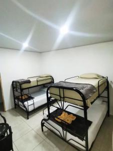 Hostel Cattleya - Monteverde, Costa Rica客房内的一张或多张床位