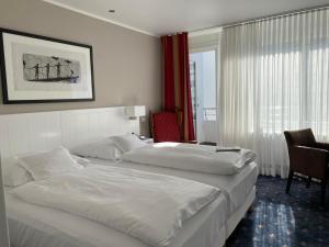 武斯彻曼酒店客房内的一张或多张床位
