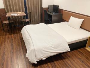 
Guest House Sanjyotakakura Hibiki客房内的一张或多张床位
