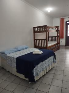 Pousada Caravelas - Centro de Paraty客房内的一张或多张床位