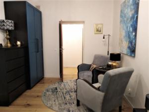 Wygodny Apartament w Śródmieściu Gdańska的休息区