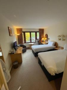 Copthorne Hotel Manchester Salford Quays客房内的一张或多张床位