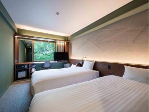 EN HOTEL Hiroshima - Vacation STAY 45747v客房内的一张或多张床位