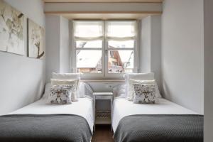 Val de Ruda Luxe 43 by FeelFree Rentals客房内的一张或多张床位