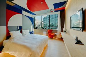 7Shang酒店客房内的一张或多张床位