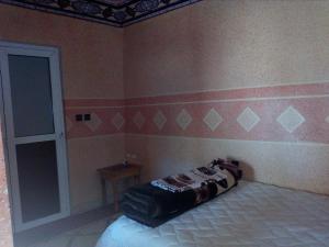 AgoutiRoom in Guest room - Gite Tawada - Happy Valley - Room for 4 People的卧室配有一张床