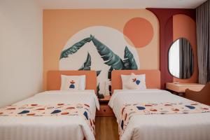 Palette Collect's Boutique Hotel Ha Long客房内的一张或多张床位