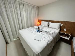 瓜拉派瑞Magnífico APARTAMENTO de Charme - 3 quartos AR CONDICIONADOS SPLIT - Beira Mar, 2 banheiros, 2 vagas garagem, 4 varandas, 2 elevadores, Redes para descanso, Wi-Fi, Air Fryer, Disney Plus, Star Plus, HBO Max, Guarda Sol, Cadeiras de Praia e Caixa Térmica的相册照片