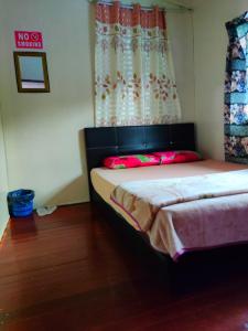 Kinabalu Valley Guesthouse客房内的一张或多张床位