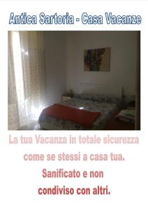 巴勒莫安蒂卡萨托瑞公寓的一张房间卧室的照片