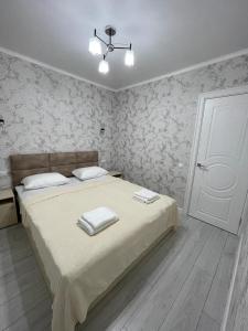 Апартаменты на Володарского客房内的一张或多张床位