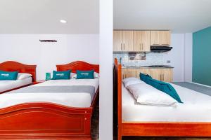 Ayenda Onix Suite客房内的一张或多张床位