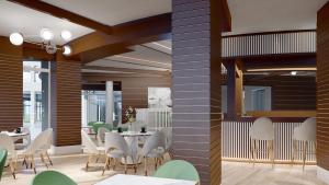 阳光海滩Effect Grand Victoria Hotel - Ultra All Inclusive的一间带桌椅的用餐室