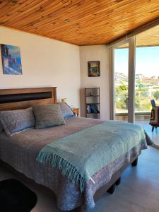 Hostal lala porteña vista al mar, baño privado y desayuno客房内的一张或多张床位