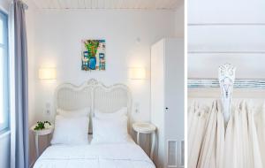 博兹贾阿达岛Ela Tenedos Hotel - Special Category的白色卧室配有白色床和白色枕头