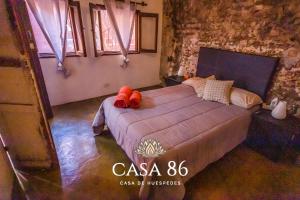 Casa 86客房内的一张或多张床位