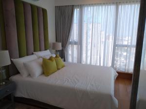 Super Luxury 2 BR Apartment in Five Star Colombo City Centre客房内的一张或多张床位