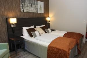 索马卡会议酒店客房内的一张或多张床位