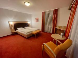 LILTON Hotel Stuttgart-Zuffenhausen客房内的一张或多张床位