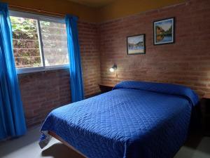 Departamentos Las Marias客房内的一张或多张床位