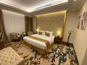 Temandra Hotel客房内的一张或多张床位