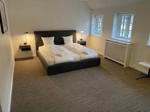 Hotel Nørrevang客房内的一张或多张床位