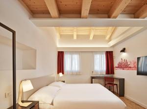 Crocevia - Locanda carsica contemporanea客房内的一张或多张床位