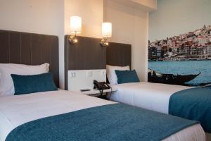 波尔图Hotel Porto Interface Trindade By Kavia的水景客房 - 带两张床