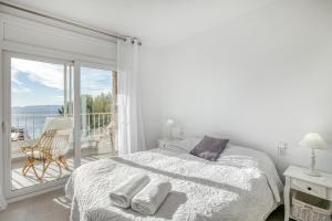 Apartament Roses Vista Mar客房内的一张或多张床位