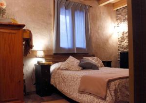 Casa Albana Pirineos客房内的一张或多张床位