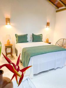 Pousada Villa dos Corais客房内的一张或多张床位