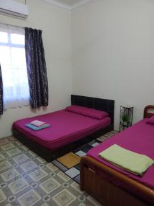 瓜拉巴苏托阿巴民宿客房内的一张或多张床位