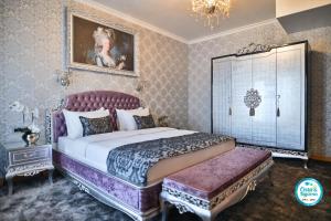 Prezident Palace Belgrade - Adults Only客房内的一张或多张床位