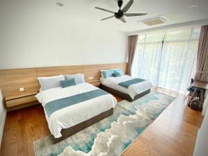 LeGrace Villa Langkawi Private Pool客房内的一张或多张床位